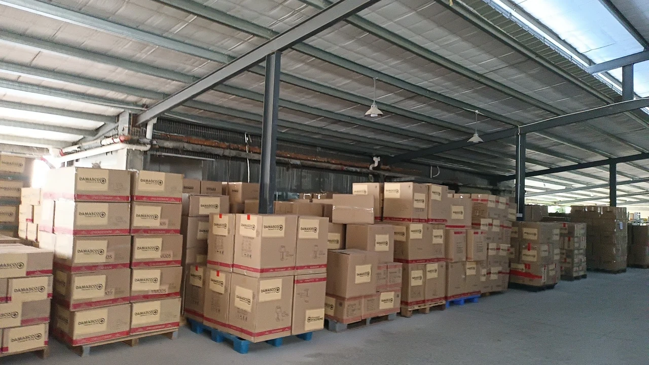 Palletized export storage warehouse prepared for international sea freight and door-to-door courier dispatch